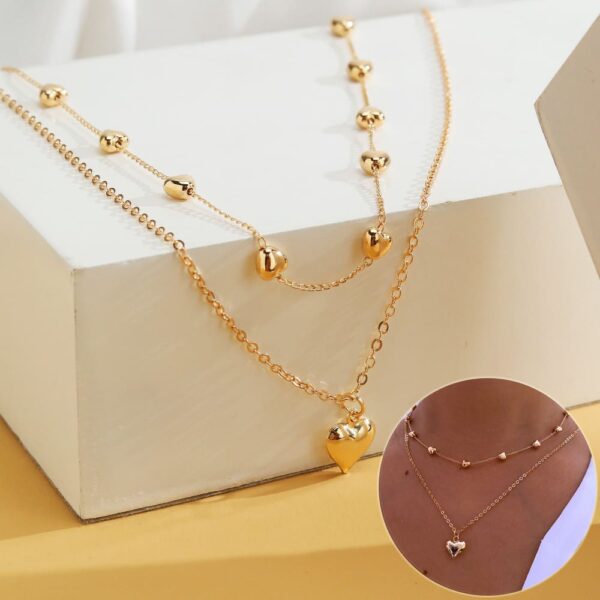 Collana a doppio strato con ciondolo a cuore e catena sottile per donna, collana multistrato in metallo color oro, gioielli alla moda, accessori.