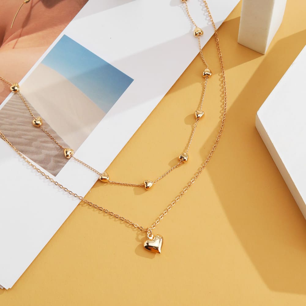 Collana a doppio strato con ciondolo a cuore e catena sottile per donna, collana multistrato in metallo color oro, gioielli alla moda, accessori. - immagine 7