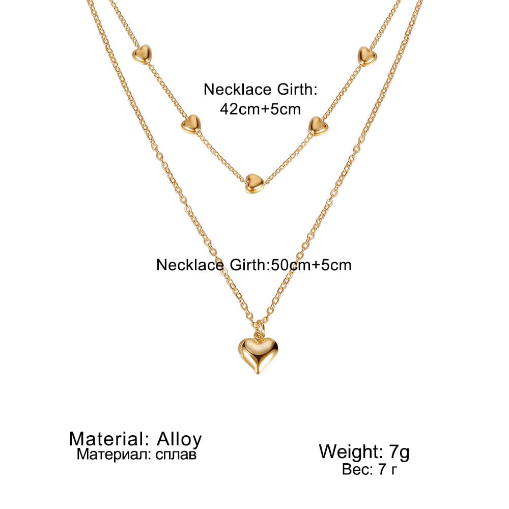 Collana a doppio strato con ciondolo a cuore e catena sottile per donna, collana multistrato in metallo color oro, gioielli alla moda, accessori. - immagine 2